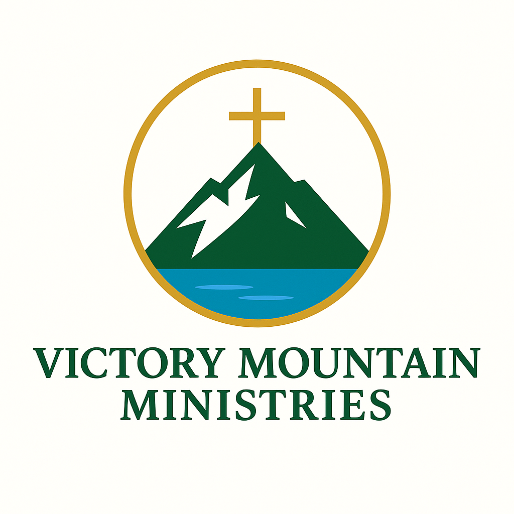 mountaintop cross with river below; official VMM Logo